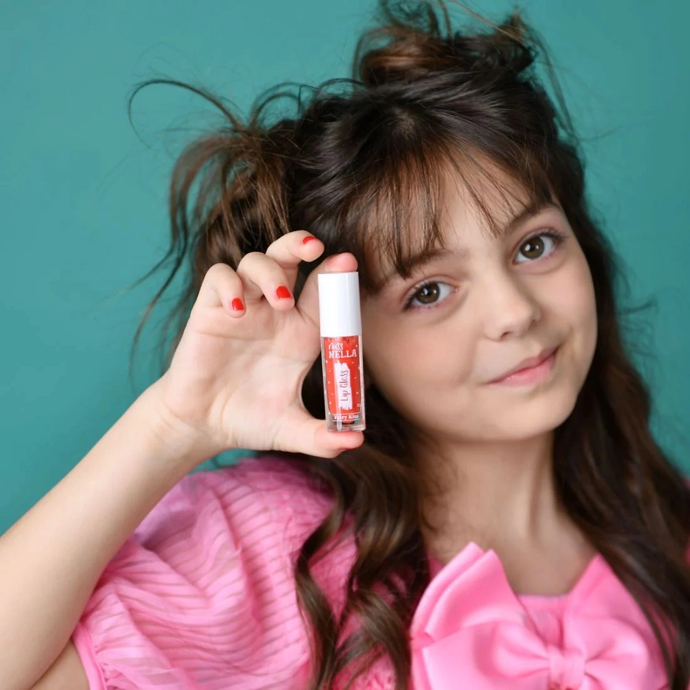 Kids Makeup moments: A touch of sparkle for little lips.