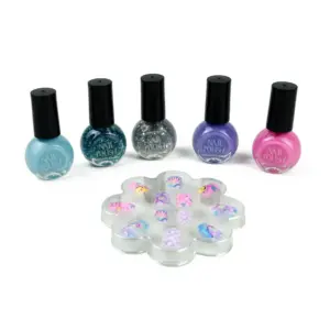 Child's fingernails adorned with colorful Kid Nail Polish.