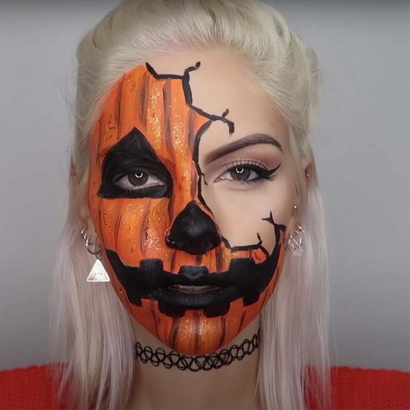 Unleash your inner fright with a Scary Face Paint transformation for a stunning Halloween night!