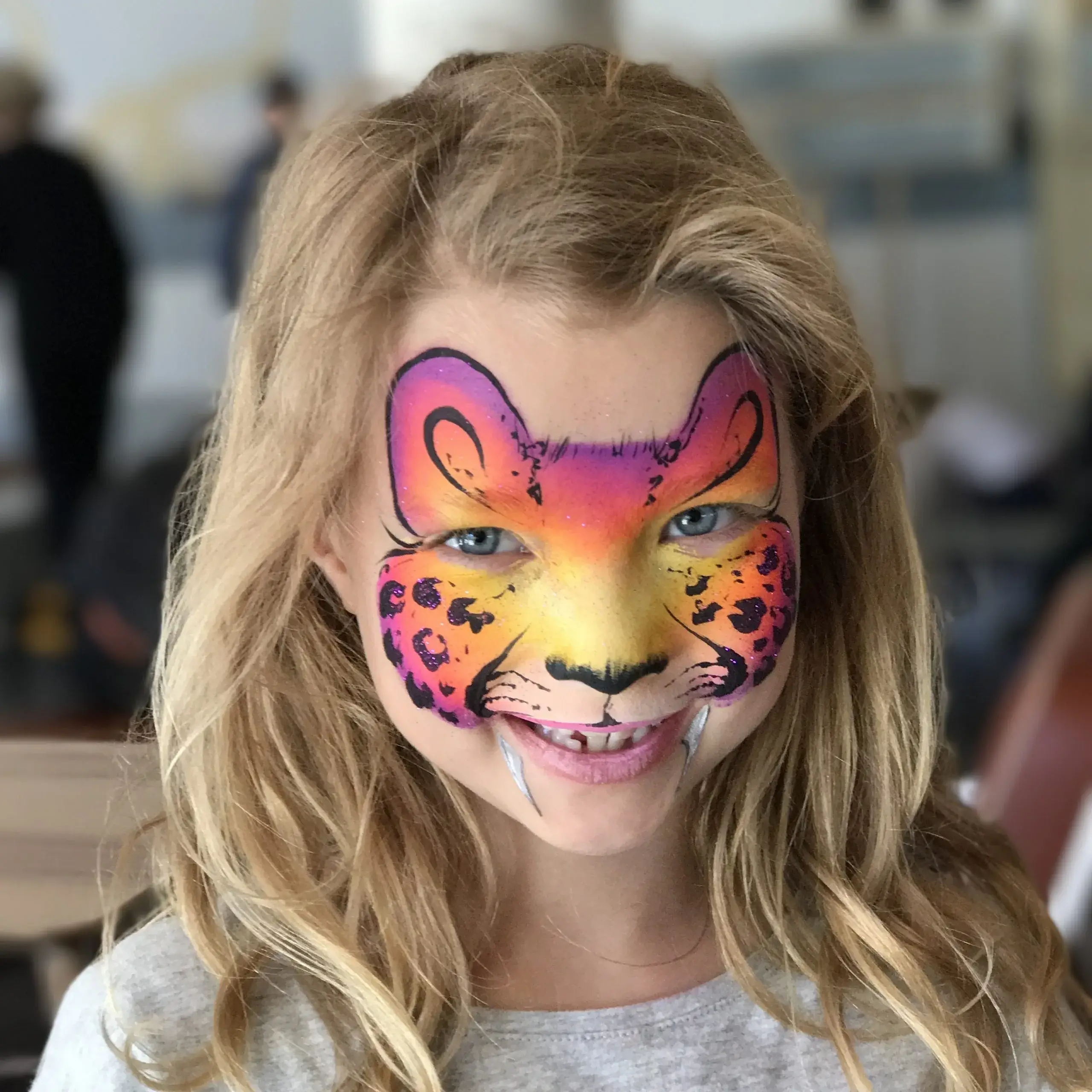 Kids enjoying colorful face painting with safe, non-toxic paints.