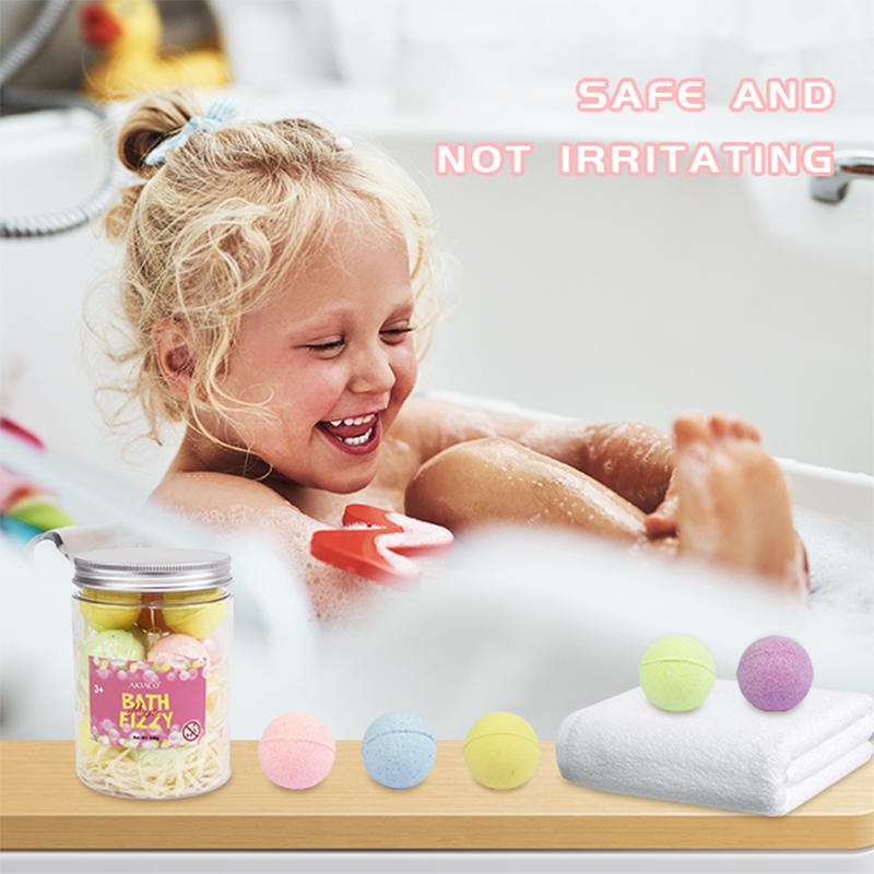 Fizzy bath bombs for kids dissolving in water, creating a rainbow of colors.