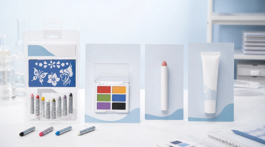 White-label children's face-paint crayons, palette, twist-up stick, and tube displayed side by side for a buyer comparison.